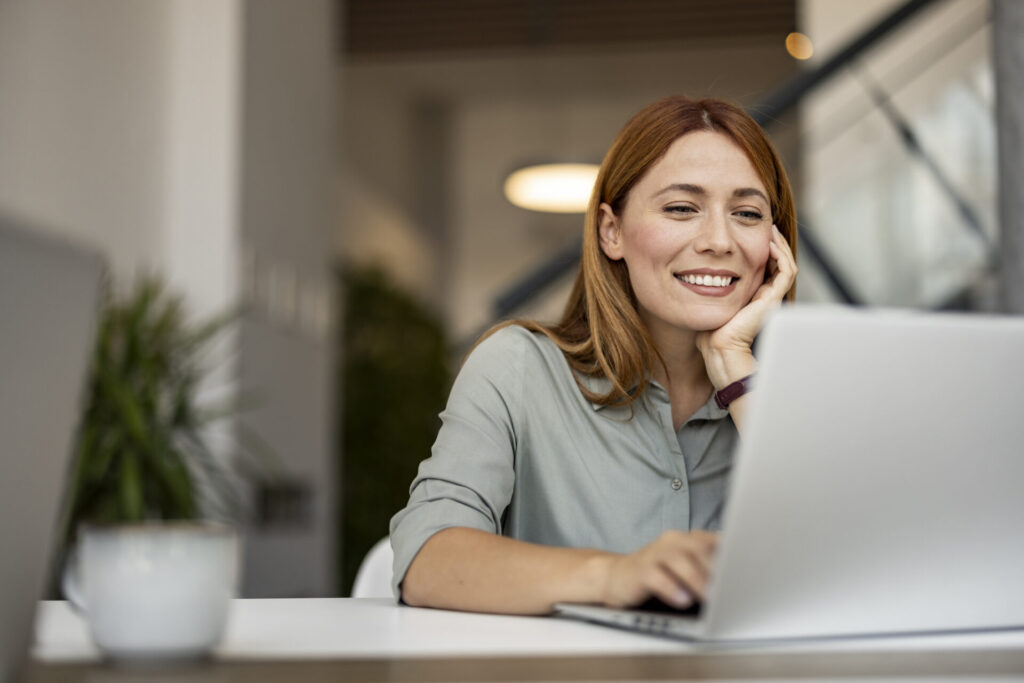 Woman Working Remotely on Laptop