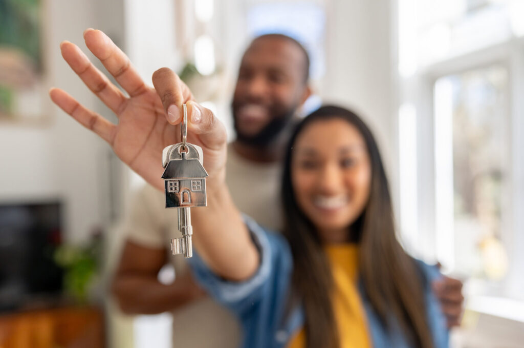 holding keys of new house